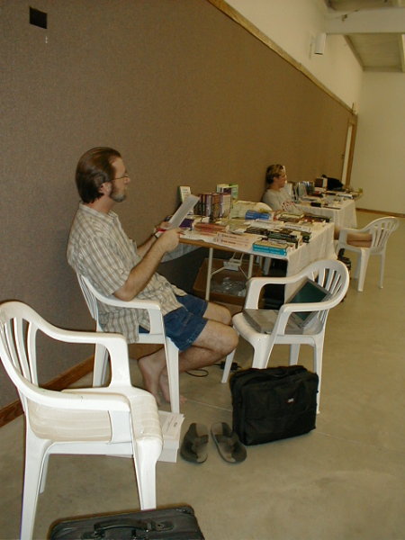 Rick prepares for lecture at booktable