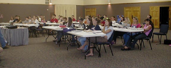 Students listening intently during the first session